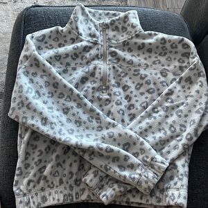 Leopard print quarter zip sweater